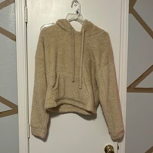 Cream colored fuzzy sweatshirt